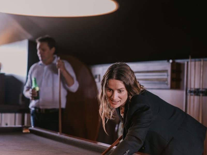 Coonawarra experiences a fun game of billiards in a stylish lounge, perfect for relaxing after a day of exploring.
