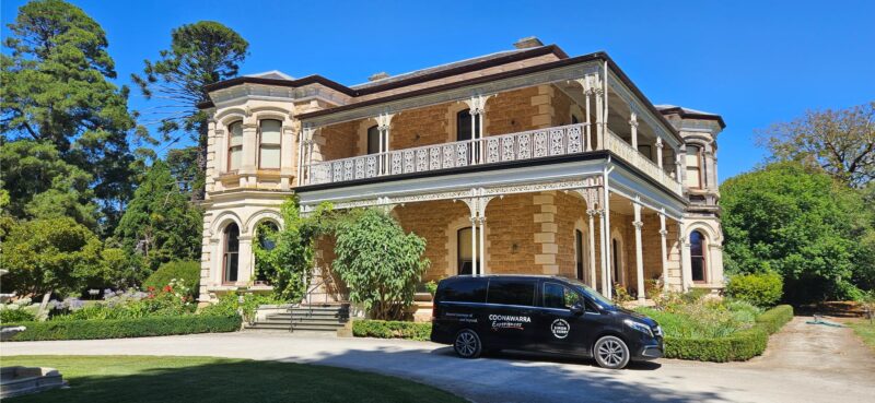 Yallum Park mansion exterior with a Coonawarra Experiences van parked outside.