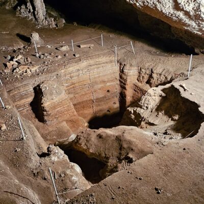 A fossil excavation site inside Naracoorte Caves, showcasing layers of geological history and palaeontological significance