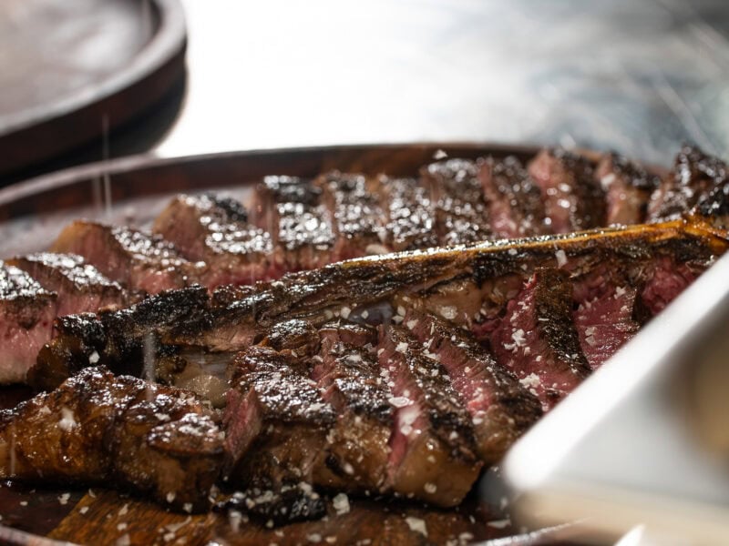 Sliced Mayura Wagyu steaks presented on a sharing platter.