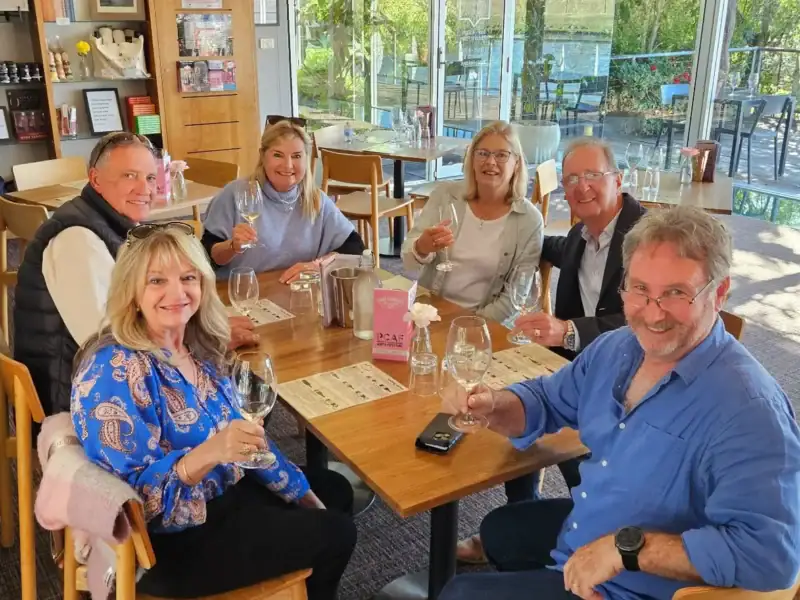 Guests enjoying a hosted wine tasting during a Coonawarra Experiences tour