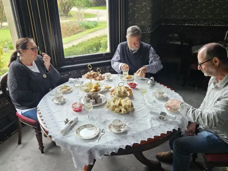 Guests enjoying private high tea at Yallum Park's dining room bay window