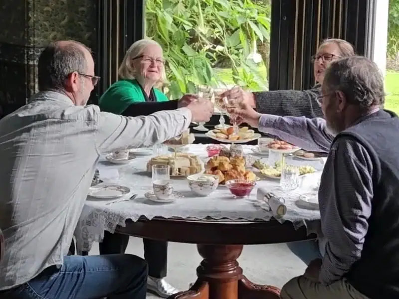 Guests raising a toast during a private high tea at Yallum Park, Penola